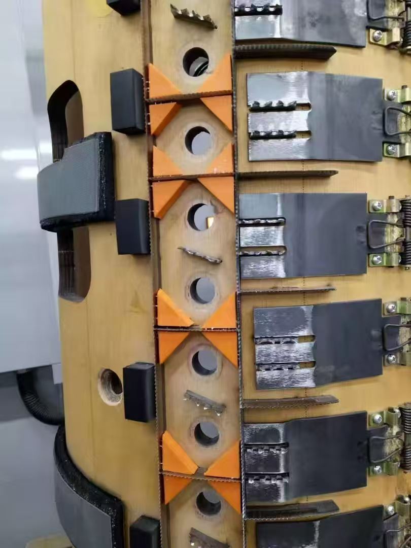 Close-up of rotary die cutting rules and components